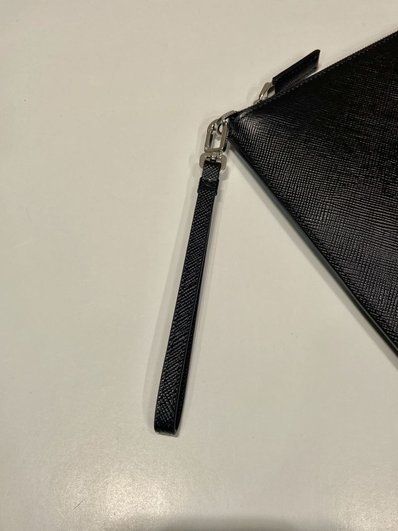 Pra*a clutch bags